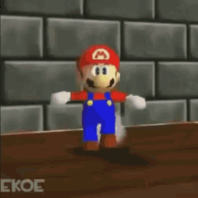mario is standing on a wooden floor in a video game surrounded by sparkles .