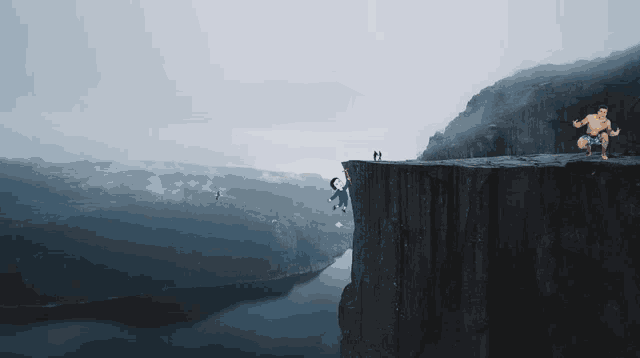 a couple of people standing on a cliff overlooking a body of water