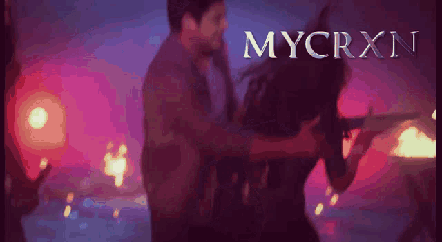 a colorful background with the word mycrxn in white