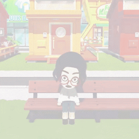a cartoon character is sitting on a bench in front of a store that says uk