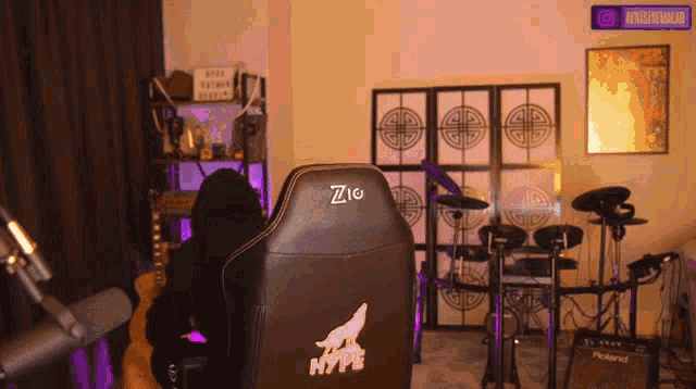 a person sitting in a chair with the word hype on the back