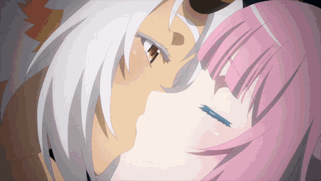 a man and a woman are kissing with the woman 's eyes closed
