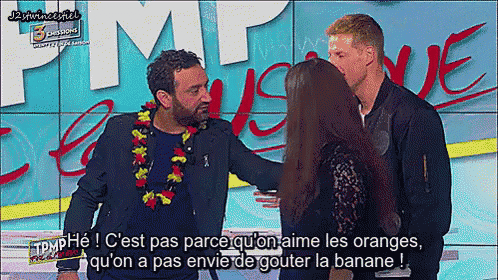 two men and a woman are standing in front of a sign that says pimp