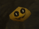 a yellow face with black eyes and a smile on it