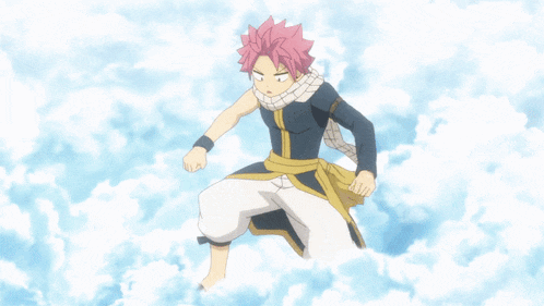 a person is flying through the air with a blue sky in the background