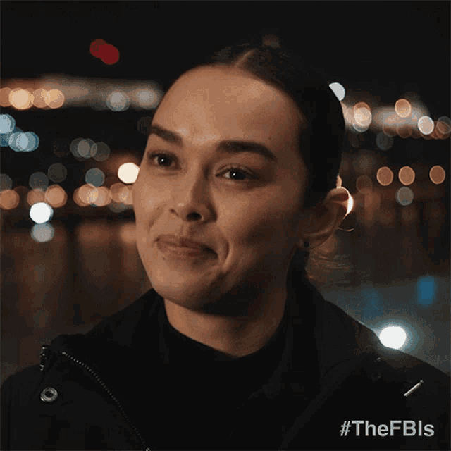 a close up of a woman 's face with #thefbls written on the bottom
