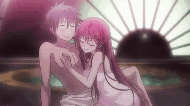 a man and a woman are sitting in a bathtub .
