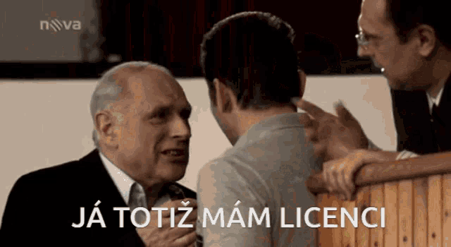 a man talking to another man with the words ja totiz mam licenci written below him