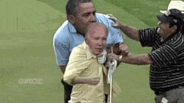 a man with a cane is being helped by two other men