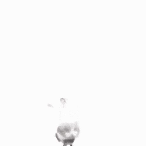 a blurry picture of a person 's face with a purple eye