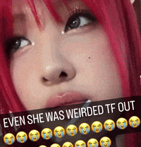 a close up of a woman 's face with the words even she was weirded tf out