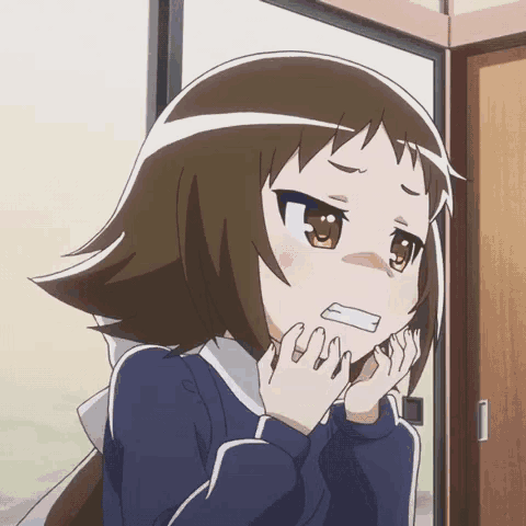 a girl with short brown hair is making a surprised face with her hands on her face