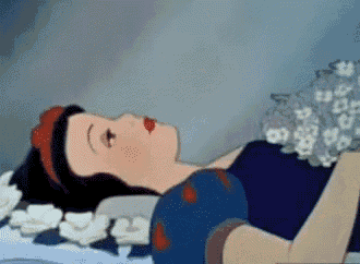 a cartoon of snow white laying on a bed
