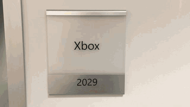 a sign on a wall that says xbox and 2029