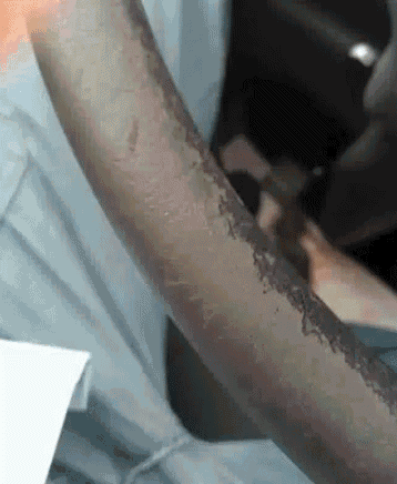 a close up of a person getting a tattoo on their arm