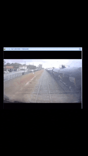 a computer screen shows a train going down the tracks and a window that says forward
