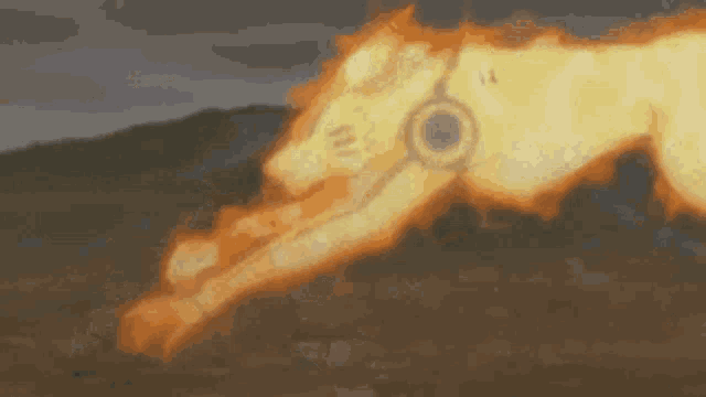 a cartoon of a wolf with fire coming out of its mouth is running across a field .