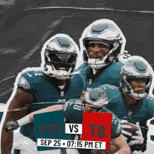 a group of football players standing next to each other with a sign that says phi vs tb