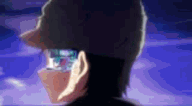 a close up of a person 's head with glasses on .