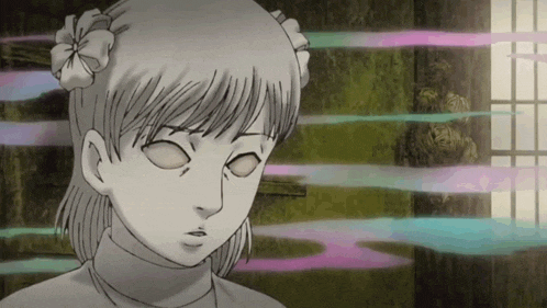 a girl with a flower in her hair is looking at something