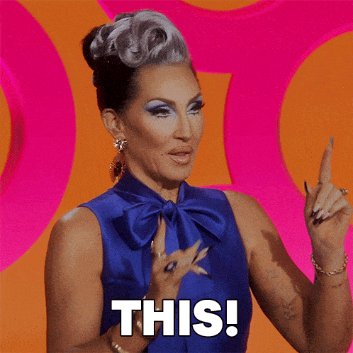a drag queen in a blue dress says i love