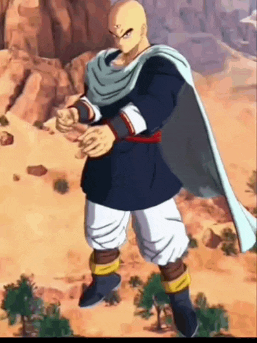 a bald man is standing in a desert wearing a cape .
