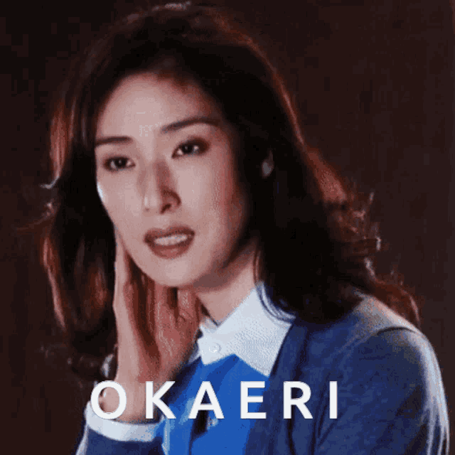 a woman with the name okaeri on the bottom of her face