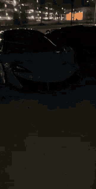 a blurry picture of a car driving down a road