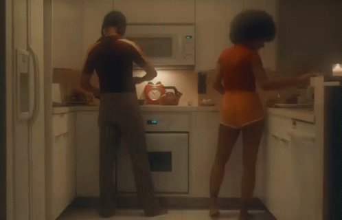 Couple Preparing Dinner Together GIF - Couple Preparing Dinner Together Helping Out GIFs