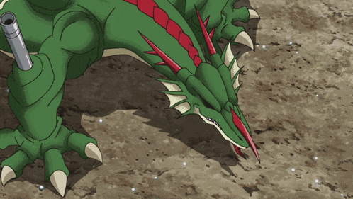 a green dragon with a purple light coming out of its eyes