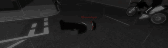 a person laying on the ground with a motorcycle in the background and the words " etat critique " written on the bottom