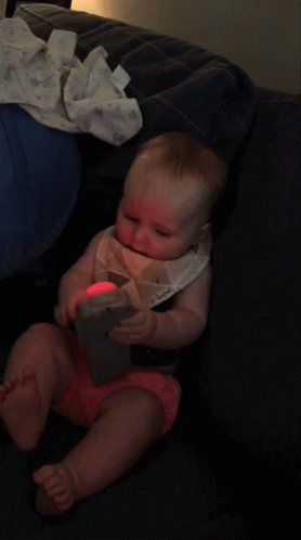Cute Baby Playing GIF - Cute Baby Playing Remote GIFs