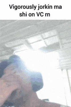 a very blurry picture of a person with the words vigorously jorkin ma shi on vc rn