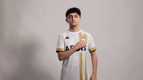 a young man wearing a white shirt that says afk on it