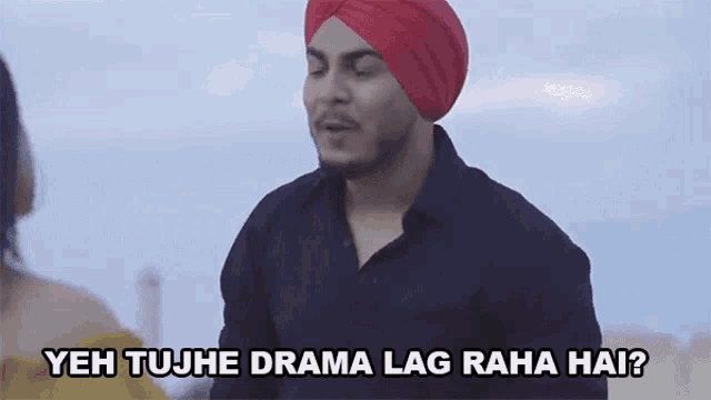 a man in a red turban says yeh tujh drama lag raha hai