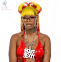 a woman is wearing a red bikini top and a big sexy necklace .