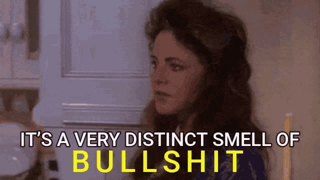 a woman in a kitchen with the words " it 's a very distinct smell of bullshit " behind her