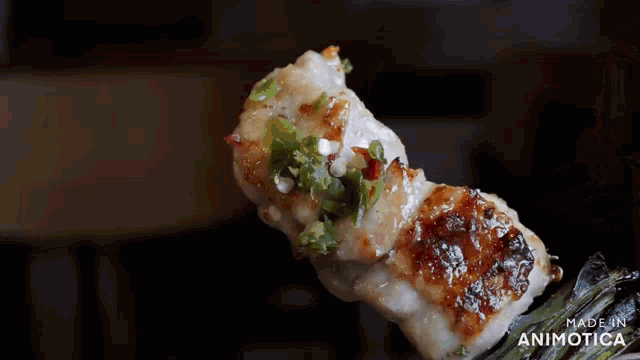 a stack of food with the words made in animatica visible