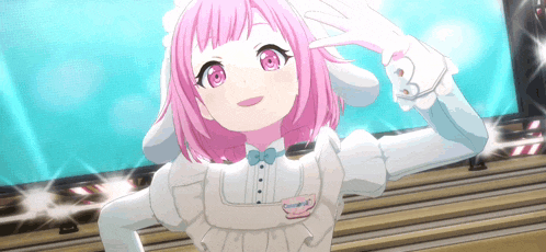 a girl with pink hair and pink eyes is wearing a white apron and a bow tie .