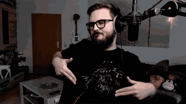 a man wearing headphones and a t-shirt that says ' i love you ' on it