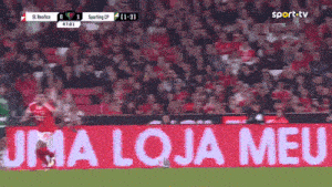 a soccer game is being played in a stadium with a banner that says uma loja meu