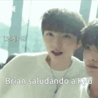 two young men are standing next to each other with the words brian saludando a kyu on the bottom