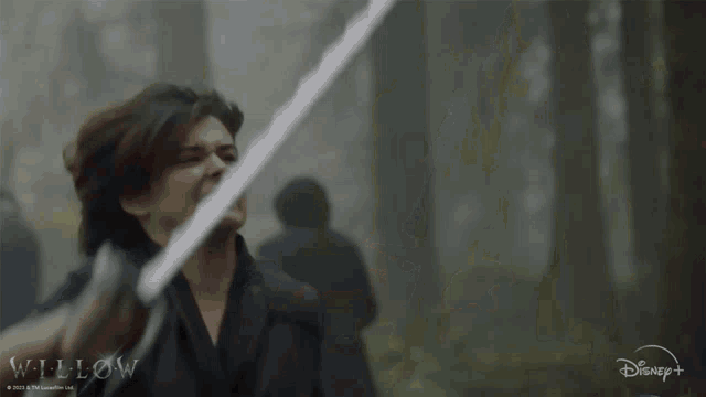 a woman with her fist in the air is featured in a disney + advertisement