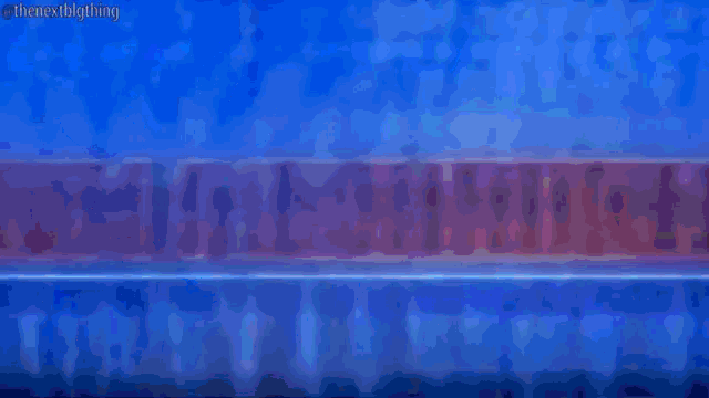a blue and red background with the words thenextbigthing on the bottom
