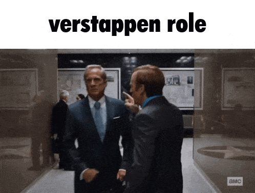 two men in suits are standing in a hallway with the words verstappen role written above them