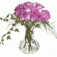a glass vase filled with purple roses and greenery on a white background .