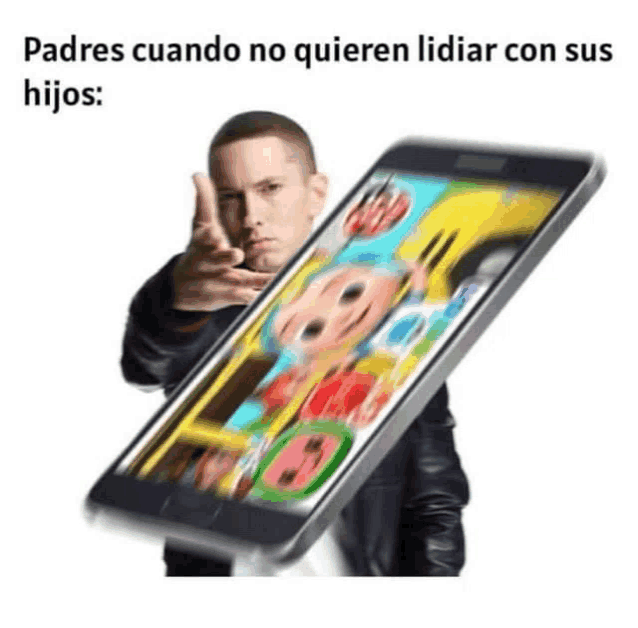 a man is holding a cell phone with a picture of a cartoon character on the screen .