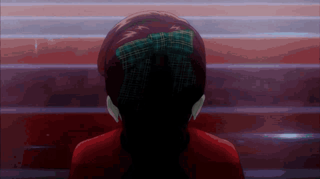 a woman with a green bow in her hair