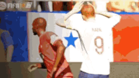 a soccer player with the number 9 on his back