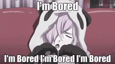 a girl in a panda costume is laying on a bed with a caption that says `` i 'm bored '' .
